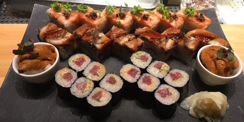 Our selection of nigiri and sushi rolls at Nobu Melbourne: (Top to Bottom) Lemon cured tuna, Eel Hako sushi, Uni sushi, and spicy tuna cut roll